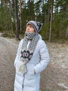 This Norwegian scarf hat with snowflakes is very warm and stylish. The scarf hat perfectly protects head and neck in cold and windy weather. It has a cotton inner layer, which is very soft and makes this cap more comfortable to wear. This scarf hat has two tails. This scarf hat is made of 100% natural wool from sheep, which assures natural and environmental friendliness. All wool items in my shop are washed  - Ready to wear! Material: 100% wool Colours:  Beige/Black Dimensions: *54-56cm (21.26-2 Nordic Style Winter Hat For Outdoor Activities, White Winter Hats For Cold Weather, Warm Winter Bonnet With Curved Brim, Nordic Style Warm Hats For Cold Weather, Nordic Warm Hats For Cold Weather, Beige Knitted Scarf For Winter, Warm Nordic Hats For Cold Weather, Nordic Warm Beanie For Cold Weather, Warm Nordic Beanie For Outdoor