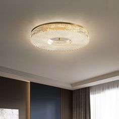 a living room scene with focus on the ceiling light