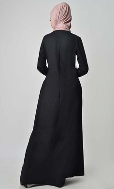 A perfect wardrobe piece for minimalistic style Round neck A stylish abaya with embroidered front and sleeves Includes both side pockets Full Sleeves FABRIC: Cotton Jersey CARE: Machine wash cold Maxi Length Abaya For Fall Workwear, Fall Workwear Abaya In Maxi Length, Fall Workwear Maxi Length Abaya, Plain Maxi Length Abaya, Fitted Long Sleeve Black Abaya, Long Sleeve Abaya For Work, Solid Long Sleeve Abaya For Work, Solid Color Long Sleeve Abaya For Work, Modest Long Sleeve Abaya For Work