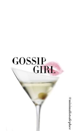 a close up of a martini glass with a pink lip on the rim and text that reads gossip girl