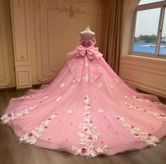 Wedding Dress With Pink Accents, Dark Pink Quinceanera Dresses, Pink Quinceanera Dresses Bow In Back, Pink Ball Gown With Corset Back For Quinceanera, Luxury Pink Whimsical Princess Dress, Pink Floor-length Princess Quinceanera Dress, Pink Princess Style Floor-length Quinceanera Dress, Fairytale Wedding Gown, Charro Quinceanera Dresses