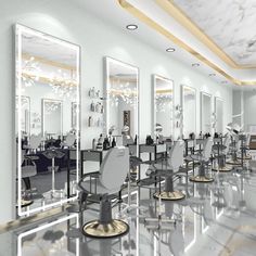 the interior of a salon with mirrors and chairs