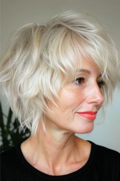 You can rock this short, platinum messy shag hairstyle and embrace your inner rebel. With textured layers, you'll have a low-maintenance style that comes together with a volumizing mousse and a quick tousle. Click here to see more stunning shag hairstyles for women over 60. Shaggy Hairstyles For Fine Hair, Haircut Summer, Bun High, Ideas Haircut, Volumizing Mousse, Short Shag Haircuts, Popular Short Hairstyles, Short Hairstyles Fine