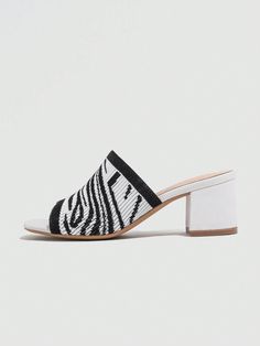 Introducing the 2024 Summer New Arrival: Chic Zebra Pattern High Heel Sandals for Women. Elevate your style with these trendy sandals featuring a unique zebra pattern. The high heel design adds a touch of sophistication to any outfit. Perfect for any summer occasion, these sandals are a must-have for fashion-forward women. Color : White Type : Mules Style : Fashionable Toe : Open Toe Pattern Type : Textured Pattern Heels : Chunky Heel Height : Mid Heel Upper Material : Fabric Lining Material : Fabric Insole Material : PU Leather Outsole Material : TPU Size US Ball Girth Foot Length Heel Height EUR36 US6 21.15 22.73 5.9 EUR37 US6.5 21.6 23.4 5.9 EUR38 US7 22.05 24.07 5.9 EUR39 US8 22.5 24.74 5.9 EUR40 US9 22.95 25.41 5.9 EUR41 US9.5 23.4 26.08 5.9 EUR42 US10.5 23.85 26.75 5.9 Striped Open Toe Sandals For Summer, Spring Zebra Print High Heels, Spring Zebra Print Heels, Chic Zebra Print High Heels, Chic Striped Summer Heels, Pattern Heels, Heels Chunky Heel, Heel Sandals For Women, Heels Chunky