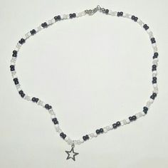 This is a black and white necklace with a silver star charm. Black And White Necklaces, White Beaded Necklaces, White Necklace, White Beads, Star Charms, Silver Stars, Necklace Gift, Gift For Women, Seed Bead