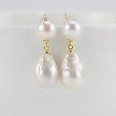 I made the earrings with 8mm and 10-11mm ivory color drop pearls with 925 silver Item No:ERS242 Item : real freshwater baroque pearl earrings Pearl shape: drop shape Big Pearl size:10-11mm Small pearl size:around 8mm Pearl color: ivory white Pearl skin:clean Pearl quality:AA Pearl luster: good Metal:silver Packing: beautiful gift box,ready for gift giving Please contact Lisha freely if you have any specific demand or need custom order, I will always try my best to meet your request. White Drop Pearl Earrings, White Drop Pearl Pendant Earrings, White Drop Pearl Earrings With Pendant, Baroque Pearl Drop Earrings In Pearl White, White Pear-shaped Pearl Pendant Earrings, White Pear-shaped Pearl Earrings With Pendant, Classic White Baroque Pearl Earrings, Double Pearl Earrings, Emerald Stone Rings