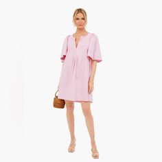 The Orchid Pink Finley Flutter Sleeve Dress Is The Flirty Frock Your Wardrobe Is Missing! Featured In A Radiant Pink Color, This Mini Has Oversized Flutter Sleeves And A V-Neckline. Pair With Heels And A Tote For Everything From Work To Brunch. V-Neckline Oversized Flutter Sleeves Side Seam Pockets Slightly Longer Back Hem Mini Silhouette Boxy Fit Material: 100% Cotton Care: Hand Wash Cold, Hang To Dry Spring Midi Dress With Gathered Flutter Sleeves, Feminine Pleated Sleeve Mini Dress For Brunch, Brunch Dress With Gathered Flutter Sleeves, Spring Daywear Dress With Flutter Sleeves, Feminine Pleated Sleeves Mini Dress For Summer, Spring Flutter Sleeve Dresses For Daywear, Feminine Summer Mini Dress With Pleated Sleeves, Flutter Sleeve Dresses For Spring Daywear, Spring Midi Dress With Gathered Ruffle Sleeves