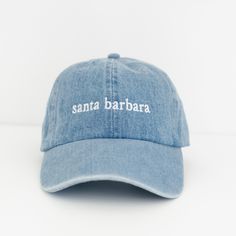 Features: Professional machine embroidery  Santa Barbara lettering design 6 panel designed hat for a low-profile lightweight fit 100% Cotton One size fits most, adjustable strap back with buckle Embroidery Santa, Hat Style, Embroidered Baseball, Embroidered Baseball Caps, Denim Cotton, Light Blue Denim, Santa Barbara, Panel Design, Black Charcoal