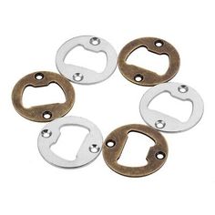 four metal rings with holes in the middle