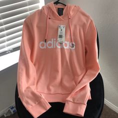 Adidas Hoodie Coral Peachy Color Adidas Athleisure Cotton Outerwear, Cozy Fit Spring Outerwear For Streetwear, Adidas Sweatshirt With Drawstring Hood For Spring, Adidas Casual Sweatshirt For Spring, Adidas Fall Outerwear With Drawstring Hood, Adidas Outerwear With Drawstring Hood For Fall, Casual Adidas Sweatshirt For Spring, Casual Adidas Fleece Outerwear, Spring Fleece Hoodie Top