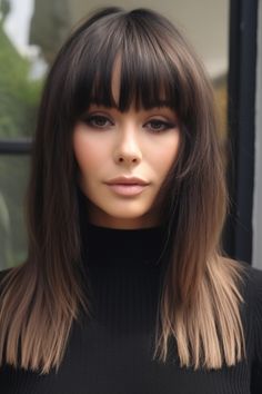 The dark luscious layers are combined with full straight bangs, which make this a daring and classy hairstyle. The straight, heavy fringe is a statement feature that directs attention to your face, and the dark layers build richness. Click here to check out more trending long layered hair with bangs. Full Bangs Long Hair, Full Fringe Hairstyles, Classy Hairstyle, Long Layered Hair With Bangs, Heavy Fringe, Medium Length Hair Straight, Layered Haircuts With Bangs, Black Hair Balayage, Layered Hair With Bangs