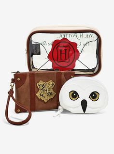 an owl purse with harry potter patches and a hogwarts crest