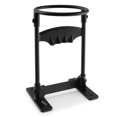 a black metal stand with an umbrella on it