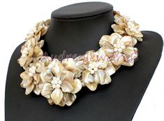 "Applications: wedding, engagement, daily wear,party Material: Pearl, shell beads size :6-8mm,15*15mm /0.23-0.31\" ;0.59*0.59\" length:18inches (1\"=2.54cm=25.4mm,1cm = 0.39 inch). Earrings Size:40mm/1.57\" Color: As show We can adjust the length of your requirements This beautiful Necklace is the perfect addition to any wardrobe. This versatile necklace can be worn with just about everything. All the product are designed and made by myself so if you want any adjustments in length or style, don' White Shell Wedding Necklace, Shell-shaped Mother Of Pearl Wedding Jewelry, Elegant Shell Jewelry For Wedding, Elegant Shell Necklaces For Wedding, White Shell Necklace For Wedding, Pearl White Shell Necklace For Wedding, Mother Of Pearl Shell Necklace For Wedding, Mother Of Pearl Flower Jewelry For Weddings, Flower Shaped Mother Of Pearl Wedding Jewelry