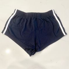 Brandy Melville Navy Blue Shorts With White Stripe Brand New With Tags Navy Blue With White Stripe On The Sides Onesize - Would Fit S/M Best *Measurements Upon Request *Please Feel Free To Ask Any Questions Navy Athleisure Shorts For Loungewear, Navy Shorts For Loungewear, Navy Loungewear Shorts, Navy Stretch Cotton Shorts, Navy Short Bottoms For Loungewear, Navy Lounge Shorts, Navy High Waist Casual Shorts, Casual Navy High Waist Shorts, Casual High Waist Navy Shorts