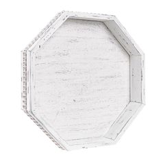 an octagonal white wooden tray with beaded edges