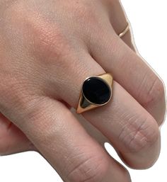 Classic Black Adjustable Signet Ring, Adjustable Black Signet Ring With Polished Finish, Minimalist Black Tarnish Resistant Rings, Minimalist Black Tarnish-resistant Rings, Black Onyx Signet Ring For Gift, Black Signet Ring With Polished Finish Gift, Black Oval Enamel Ring For Anniversary, Gift Black Enamel Ring With Polished Finish, Black Oval Enamel Ring As Gift