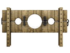 an old wooden door with metal latches and round holes on the front, isolated against a white background