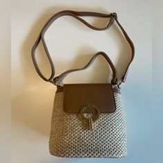 This Is The Perfect Summer Bag! I Bought It On Instagram And It Doesn’t Have A Brand Tag, I Have Never Used It, I Ordered For One Event And It Arrived Delayed, So I Did Not Use It. It Is In Perfect Condition. If You Need The Dimensions Please Let Me Know And I Can Measure It! Beige Straw Bag With Detachable Handle For Everyday, Everyday Beige Straw Bag With Detachable Handle, Everyday Khaki Shoulder Bag With Braided Handles, Brown Satchel Straw Bag For Day Out, Light Brown Bag With Adjustable Strap For Day Out, Trendy Neutral Bags For Day Out, Trendy Neutral Bag For Day Out, Casual Light Brown Shoulder Bag For Day Out, Beige Bucket Bag With Removable Pouch For Day Out