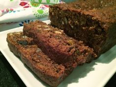 two slices of chocolate banana bread on a white plate