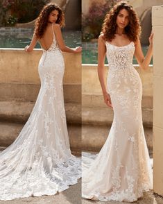 a woman in a wedding dress standing next to a fountain