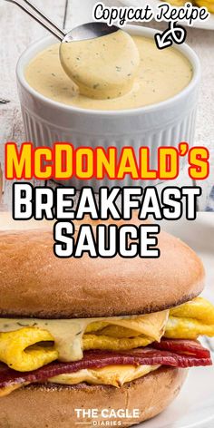 mcdonald's breakfast sauce on a sandwich with bacon and egg in the middle, next to a bowl of macaroni and cheese