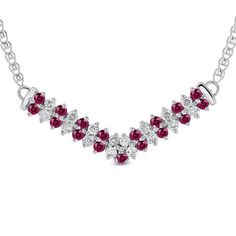 Raise the fashion bar with this contemporary gemstone and diamond necklace. Crafted in 14K white gold, this spectacular style showcases pairs of 1.75mm bright red rubies and sparkling diamonds alternating along a double-row chevron-shaped design. Radiant with 1/3 ct. t.w. of diamonds and a brilliant buffed luster, this 1.25-inch look suspends centered along a 16.0-inch fancy chain that secures with a spring-ring clasp. Red Diamond Cut Diamond Necklace, Red Diamond Cut Diamond Necklaces, Red Ruby Necklace With Diamond Accents, Red Ruby Necklaces With Diamond Accents, Red Diamond Cut Necklaces, Red Diamond Necklace With Brilliant Cut, Fine Jewelry Red Diamond Necklace With Brilliant Cut, Fine Jewelry Ruby Diamond Necklace In Red, Red Ruby Diamond Necklace In Fine Jewelry Style