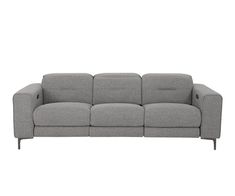 a grey couch sitting on top of a white floor