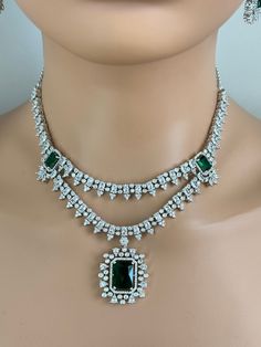 Emerald CZ diamond necklace, American Diamond wedding necklace, Cz jewelry, Indian, Pakistani, Punjabi wedding jewelry, Bridal necklace Regular Size And Adjustable with rhodium finish Ships from California, USA Delivery in 2-5 business days in the USA. Other colors can be found here https://www.etsy.com/listing/1423097794/sapphire-cz-diamond-bridal-necklace?ref=listings_manager_grid https://www.etsy.com/listing/1423095388/emerald-cz-diamond-bridal-necklace?ref=listings_manager_grid Color, shades, and texture displayed may slightly vary from the actual product due to digital image limitations. We request you consider these minor variations. Please expect the possibility of some slight imperfections when buying handmade jewelry. Please let me know if you have any questions. Arrives in a gift Punjabi Wedding Jewelry, Diamond Wedding Necklace, Gala Jewelry, Diamond Necklace Wedding, Star Bangle, Diamond Necklace Set, Punjabi Wedding, Jewelry Indian, Jewelry Bridal