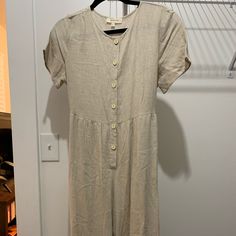 The Most Comfortable Jumpsuit You’ll Ever Wear. Bought Without Trying On, Absolutely Love It But It Was Just A Little Too Big On Me! Beige Short Sleeve Jumpsuits And Rompers For Vacation, Casual Beige Jumpsuits And Rompers For Daywear, Beige Casual Jumpsuits And Rompers For Daywear, Beige Summer Jumpsuits And Rompers, Casual Fitted Jumpsuits And Rompers In Neutral Color, Casual Neutral Fitted Jumpsuits And Rompers, Casual Cream Fitted Jumpsuits And Rompers, Cream Fitted Jumpsuit And Romper Casual Style, Casual Cream Fitted Jumpsuit