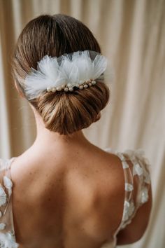 Introducing the Kea Comb, a modern twist on a traditional bridal hair accessory. Hand wired clusters of freshwater pearls adorn a delicate gold hair comb, adding a touch of playfulness and uniqueness to your look. Made with light ivory tulle, this comb is perfect for the unconventional bride. Dimensions: Hair comb (including tulle) is 6" wide and 4" tall. Each order is thoughtfully gift wrapped and shipped in a gold embossed Luna + Stone branded keepsake box. These boxes are perfect for gifting Bride Hair Accessories Headpieces, Pearl Hairpiece, Retro Bob, Unconventional Bride, Pearl Bridal Headpiece, Gold Hair Comb, Bridal Hair Accessory, Dance Hairstyles, Bride Hair Accessories