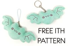 a green stuffed animal keychain with the words free ith pattern