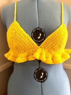 Cute ruffle top! prefect for summer!🌅 Unlimited colors & a various of sizes! Please include cup size (AA, A, B, C etc ) MATERIAL product is made of acrylic yarn. I am willing to use other type of yarn materials if requested. ORDER DETAILS Usually it will take me 5-7 days for creating a crochet top. Timing may vary depending on size and quantity. If you have any questions please be sure contact me  Thank you !❤ Handmade Yellow Tops For Beach, Bohemian Crochet Top With Ruffles For Beach, Ruffled Crochet Top For Spring Vacation, Summer Crop Top With Ruffles For Vacation, Summer Ruffled Crop Top For Vacation, Cute Sleeveless Crochet Top For Beach, Cute Crochet Beach Top For Spring, Cute Fitted Crochet Top For Beach, Cute Crochet Top For Beach In Spring