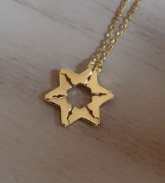 "Gold Butterfly Jewish Star of David Pull Apart Necklace, Boho Modern Necklace In the time of the Spanish Inquisition, converts to Catholicism who secretly continued to practice their Jewish faith might have worn an articulated pendant of butterflies like this, which forms a Star of David when it is closed. Open the necklace, turn it upside down and wear it as a butterfly necklace. Sterling Silver with blue opal with chain (16\"). This necklace is Gold plated over Sterling silver and is 45cm lon Unique Gold Star-shaped Jewelry, Unique Gold Star Shaped Jewelry, Symbolic Star-shaped Engraved Necklaces, Star-shaped Engraved Necklace For Gift, Unique Star-shaped Necklace For Gift, Unique Star-shaped Gift Necklace, Symbolic Star Necklace Gift, Symbolic Handmade Star Necklace, The Spanish Inquisition