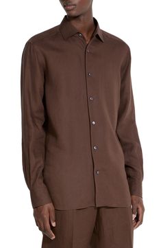 Topped with a one-piece collar, this button-up shirt is tailored in a layering-friendly fit from breathable linen and finished with hand-stitched details. Front button closure Spread collar Long sleeves with button cuffs 100% linen Dry clean Made in Italy Designer Clothing Brown Linen Shirt With Button Closure, Relaxed Fit Button-up T-shirt With Button Closure, Tailored Button-up Shirt With Hidden Closure, Merino Wool Button-up Outerwear With Button Closure, Slim Fit Button-up Shirt With Button Closure, Designer Clothes For Men, Modern Outfits, Women's Summer Fashion, Athletic Women