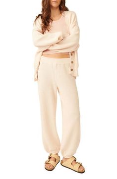 Be ready for lounging or a quick jaunt to the coffee shop in this matching cardi-and-pants set knit in a cozy waffle stitch. 23" length; 25" inseam; 10 1/2" leg opening; 12" front rise; 14" back rise (size Medium) Cardigan has a front button closure; V-neck; ribbed cuffs and hem Pants have an elastic waist; elastic cuffs 100% cotton Dry clean or hand wash, dry flat Imported Coverall Jumpsuit, Hem Pants, Waffle Stitch, How To Hem Pants, Fashion Sets, Be Ready, Jumpsuits For Women, Pants Set, Coffee Shop