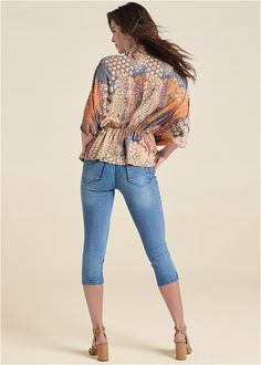 Flirty with its peplum, faux-wrap styling, this printed V-neck top brings breezy elegance to your wardrobe. The crisp print adds a touch of interest to the relaxed, feminine fit with loose dolman sleeves and an elastic waist to emphasize your shape.  * Sizes: XS (2), S (4-6), M (8-10), L (12-14), XL (16)  * Plus sizes: 1X (18-20), 2X (22-24), 3X (26-28)  * Print placement may vary  * Oversize fit  * Faux-wrap  * V-neck  * Peplum hem  * Fabric has stretch  * By Lascana for VENUS  * Viscose. Imported Abstract Mirage, Statement Skirt, Swim Trends, Surplice Neckline, Peplum Hem, Work Wear Women, Plus Size Shopping, One Piece Suit, Swimsuit Cover Ups