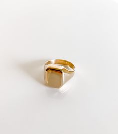 This gorgeous 12mm octagon signet ring is everyone’s favorite! Make a statement with this classic ring. Only available in size 7 Luxury Gold Signet Ring For Everyday Wear, Classic Rectangular Signet Ring Stamped 14k, Gold Octagon Ring With Polished Finish, Octagon Gold Rings With Polished Finish, Formal Square Cut Signet Ring With Polished Finish, Formal Square Cut Polished Signet Ring, Octagon Signet Ring With Polished Finish As Gift, 14k Gold Octagon Signet Ring Gift, Classic Gold Octagon Signet Ring