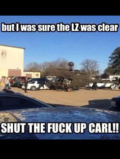 a bunch of cars parked in front of a building that says, but i was sure the lz was clear