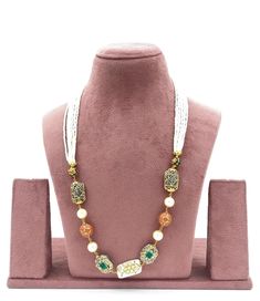 The Jaipur Stone Necklace Bead Mala is a luxurious piece of jewelry that beautifully blends the opulence of Jaipur stones with the timeless elegance of pearls. This exquisite mala features a stunning array of carefully selected beads, each showcasing the rich and vibrant colors that Jaipur is renowned for. The beads are meticulously strung together to create a harmonious design, complemented by lustrous pearls that add a touch of sophistication. This necklace is a perfect representation of luxur Wedding Jewelry Indian, Sabyasachi Jewelry, Sabyasachi Jewellery, Necklace Indian, Cultural Celebration, Jewelry Indian, Mala Necklace, Contemporary Outfits, Wedding Jewellery Necklace