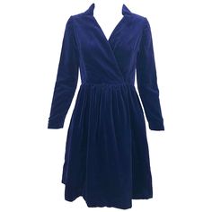 Chic mid to late 60s ADELE SIMPSON navy midnight blue long sleeve wrap shirt dress! Features a flattering fitted bodice with a forgiving full skirt. Wrap style buttons on the interior left waist, with hook-and-eye closure and snap at exterior right waist. POCKETS at each side of the hips. Collar at neck can be worn down or flipped up for a more dramatic effect. Luxe cotton velvet feels wonderful against the skin. Fully lined. A beautiful piece of American fashion history that is extremely well m Wrap Shirt Dress, Belted Wrap Dress, Skirt Wrap, Designer Evening Dresses, Evening Dresses Cocktail, Wrap Shirt, 1940s Dresses, Vintage Velvet, Blue Long Sleeve