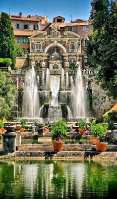 a large fountain in the middle of a park