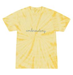 a yellow tie dye shirt with the word embroidery on it