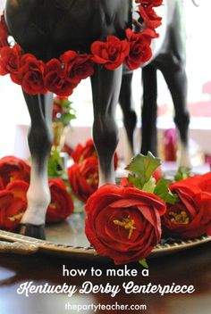 a close up of a horse statue on a table with flowers around it and the words how to make a kentucky derby centerpiece