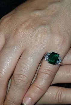 Gorgeous Vintage GEM GREEN natural EMERALD set in platinum ring ,center Emerald natural emerald weight 3.47ct GIA Cert SIZE 10.3x7.7mm bright ,very lively ,very sparkly ,nice setting. gorgeous green color ,full of fire. set two side white sapphire weight 1.61ct Ring size 4.5 Optional to resize This tremendous old vintage ring is in a very good condition. Fabulous vintage piece in good condition Appraisal available Retail value $12,500 net. Platinum Green Diamond Ring, Green Diamond Platinum Ring Fine Jewelry, Green Diamond Platinum Ring With Prong Setting, Fine Jewelry Green Diamond Platinum Ring, Fine Jewelry Green Diamond Ring In Platinum, Green Platinum Diamond Ring, Platinum Green Gemstone Rings, Green Platinum Ring For May Birthstone, Green Gemstone Platinum Ring