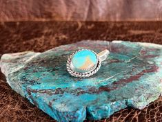 We love Hat Tokens! This token is made of sterling silver & beautiful Royston Turquoise with twist wire trim. These tokens attach to your hat leaving no holes or damage. This token could also be attached to other accessories/items, and could also be worn as a pendant on beads or chains. We are excited to offer this unique piece! Adjustable Oval Western Style Turquoise Ring, Adjustable Oval Turquoise Western Ring, Adjustable Sterling Silver Turquoise Ring In Western Style, Royston Turquoise, Love Hat, Twisted Wire, Rope Design, Adjustable Ring, Adjustable Rings