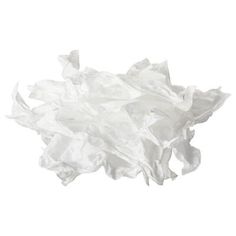 a pile of white tissue sitting on top of a table