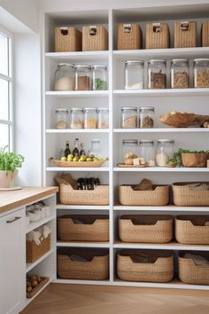 an organized pantry with lots of baskets and food in the bins on the shelves