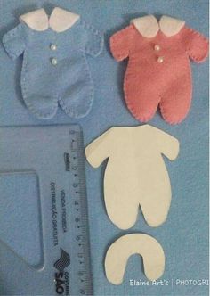 three felt baby ones and a ruler on a blue background with text that reads, sewing supplies for babies