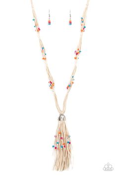 Dainty orange, blue, and pink wooden beads are sporadically threaded along earthy strands of knotted twine-like layers draped across the chest. Matching beaded strands stream out from the bottom of a decorative silver cap, creating a whimsical tassel. Features an adjustable clasp closure.

 Sold as one individual necklace. Includes one pair of matching earrings. Necklaces Dainty, Multi Necklace, Multi Coloured Necklaces, Diy Jewelry Necklace, Silver Caps, Paparazzi Accessories, Paparazzi Jewelry, Blue And Pink, Boutique Jewelry